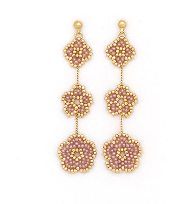 Aretes nomeolvides triples dorados.